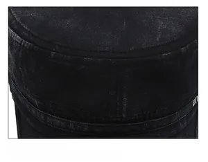 Detailed stitching of black vintage cotton cadet cap with small metal decorative plate