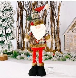 Close-up of telescopic Santa Claus doll with red plaid and festive knit textures