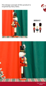 Close-up of wooden nutcracker soldier figurine with red uniform and gold drum details