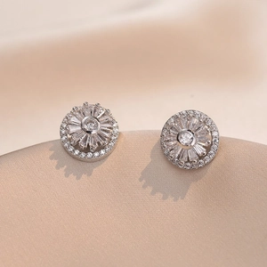 Elegante roterende bloemknopoorbellen met glinsterende zirkonia in zilveren afwerking