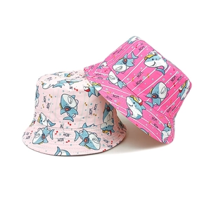 Kids shark print sun hats in light pink and rose pink with cute cartoon patterns