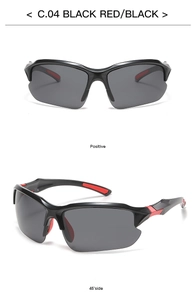 Macro view of outdoor cycling sunglasses showing black red frame and side rubber pads