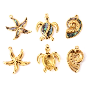 6Pcs gold ocean charms featuring sea turtles and starfish with abalone shell inlays