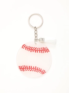 Close-up of baseball acrylic keychain with red stitching patterns and a white tassel