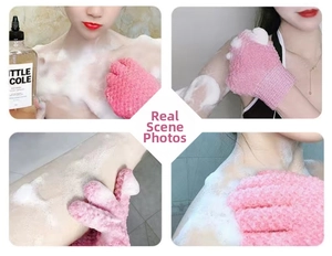 Detailed view of pink cat paw exfoliating gloves producing rich lather for skin care