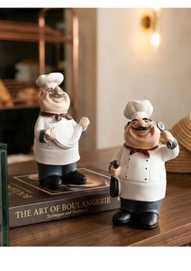Detailed view of creative resin chef figurines for kitchen and bakery shop decoration