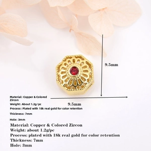 Macro shot of 18k gold plated hollow hexagon bead with colorful zircon stones