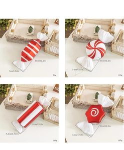 Detail showing four styles of red and white candy Christmas ornaments with dimensions