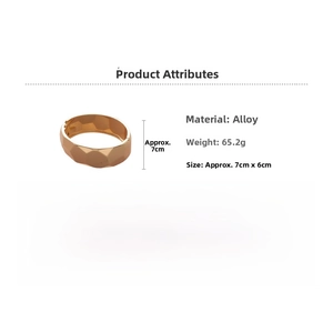 Detail view of irregular gold alloy bangle with geometry facets, 7cm by 6cm size