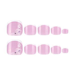 Pink French tip press-on toe nails with white floral patterns and sparkling rhinestones