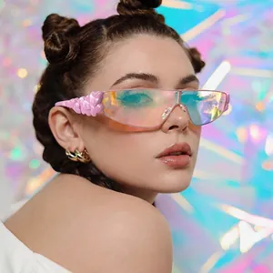 Fashionable Y2K wrap around sunglasses with pink heart frame and rainbow holographic lens