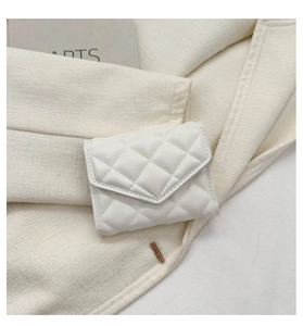 Detailed view of a white quilted PU leather card wallet with elegant gold hardware