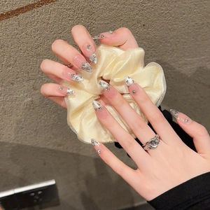 Handmade press-on nails with leopard cat-eye pattern, silver glitter and luxury rhinestones