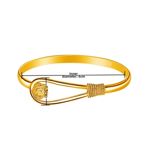 Detailed view of golden rose bracelet with 6cm inner diameter and metal weaving