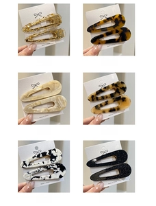 Detail of 6 patterns of acetate teardrop hair clips including tortoiseshell and marble