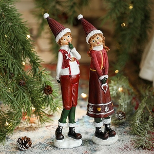 Pair of creative Christmas resin figurines featuring festive boy and girl in red and white