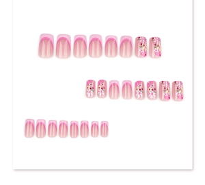 Detailed set of pink French tip press-on nails with colorful floral patterns and square shapes