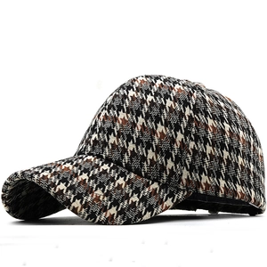 Thick houndstooth baseball cap for men and women featuring a classic brown and black weave