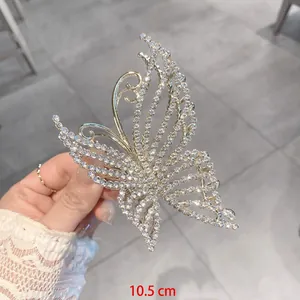 Detail showing the 10.5cm length of this crystal butterfly hair claw clip for women