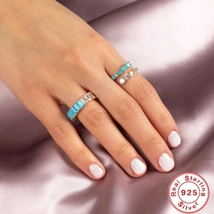 Adjustable S925 sterling silver ring set with turquoise and white cubic zirconia stones