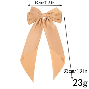 Detailed size chart for peach bow hair clip showing 33cm length and 19cm width specs
