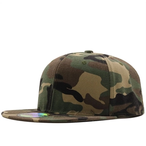 Classic woodland camouflage flat brim baseball cap made of cotton twill in a side 45-degree view