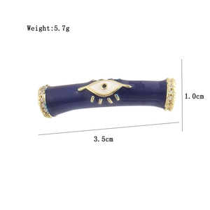 Detailed size view of blue enamel evil eye charm with 18K gold plating and weight 5.7g