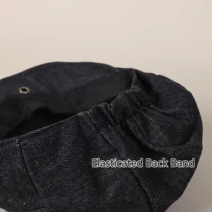 Japanese style denim newsboy cap in dark blue featuring an elastic back for adjustable fit