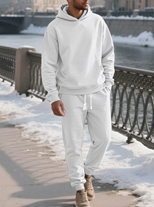 Close-up of light gray men's hoodie set featuring intricate jacquard diamond texture