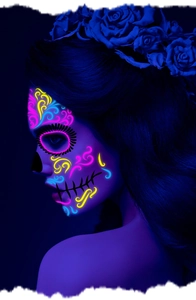 Macro shot of glow-in-the-dark sugar skull face tattoo stickers for Halloween parties