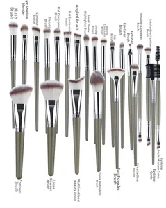 Detailed view of 23-piece professional makeup brush set in grey-green with dual-tone bristles