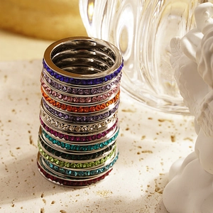 Colorful stackable birthstone rings in stainless steel with crystal eternity bands