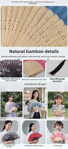 Detailed macro view of carved bamboo fan ribs and silk fabric with plum blossom patterns