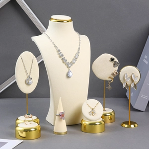 Premium cream velvet and gold metal jewelry display set for necklaces and rings