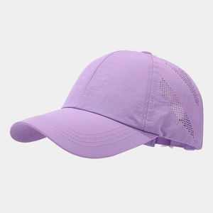 Detail view of laser-cut ventilation holes on purple breathable quick-dry baseball cap