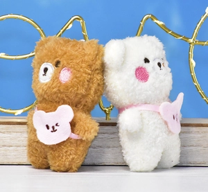 Detailed view of 4-inch brown and white fluffy teddy bear plush keychain toy pendants