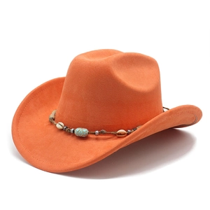 Detail of orange cowboy hat with ethnic beads and shell decoration on suede band