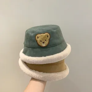 Winter plush bear bucket hats for kids in dark green and khaki with thick faux fur trim
