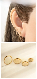 Detailed set of four gold titanium hoop earrings with white zircon pave setting