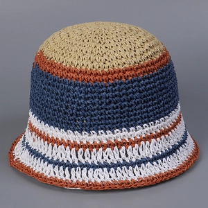 Close-up detail of handmade striped straw bucket hat for women showing breathable weave