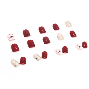 Christmas festive red and gold reindeer press-on nails in short square oval shape