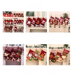 Detail view of 6-piece Christmas stocking set with Santa snowman and reindeer characters