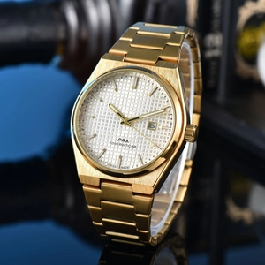 Detailed macro view of the gold PRX watch face with Powermatic 80 movement markings