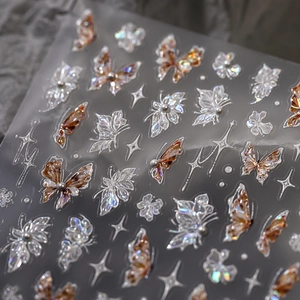 Exquisite 3D butterfly nail art stickers with iridescent pearls and vintage amber finish