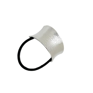Brushed silver U-shaped ponytail cuff with elastic band on a clean white background