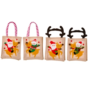 Set of four striped Christmas linen gift bags with Santa, snowman and reindeer designs