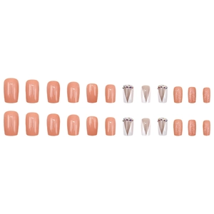 Faux ongles carrés orange avec strass et motifs géométriques blancs de style français