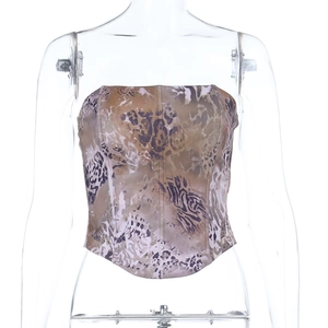 Detail of leopard print tube top featuring cinched waist and curved hem on mannequin