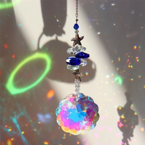 Starfish crystal suncatcher with faceted glass ball creating vibrant rainbow light