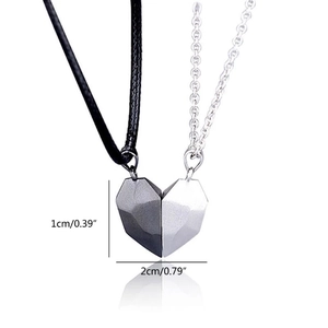 Macro detail of magnetic heart necklace showing precise dimensions and polished finish